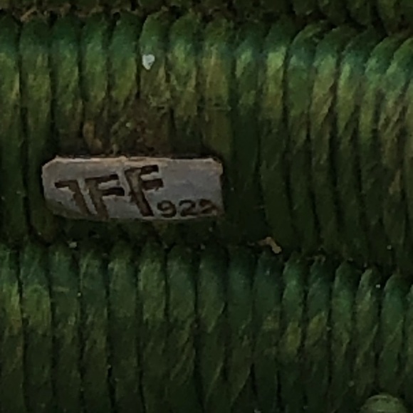 Heavy mother of pearl with green raffia and applied pieces
One of a kind
Stamped - Picture 8 of 11